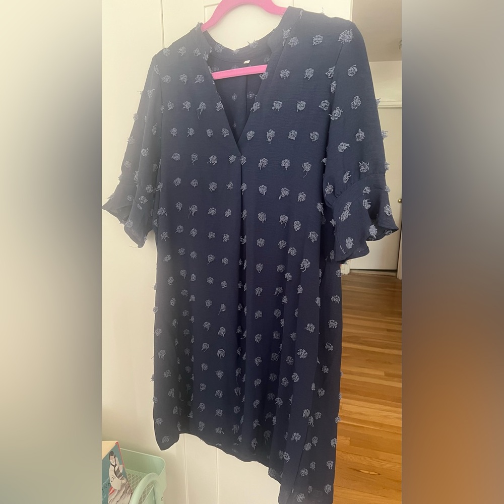 Elegant Navy Blue Dress with Floral Accents